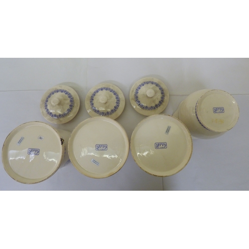 147 - Ditto china kitchen cannisters
