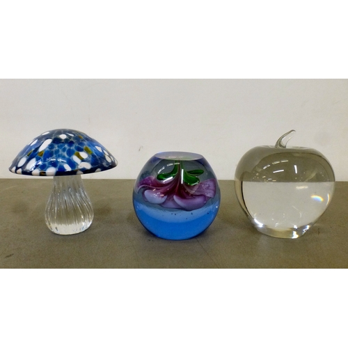 152 - Decorative glass paperweights: to include a Barley Lands Glass Works example, fashioned as a mushroo... 