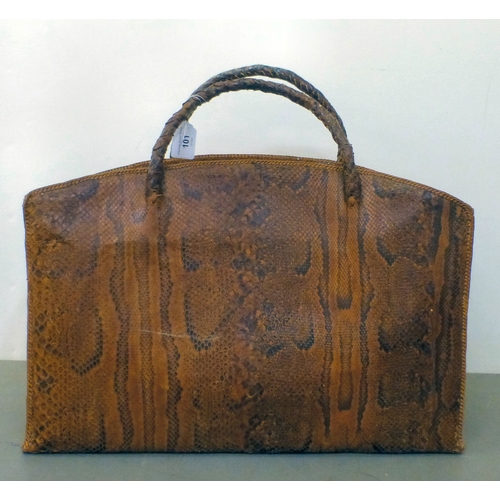 101 - A vintage snakeskin overnight bag  14