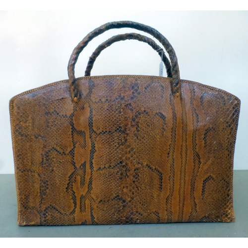101 - A vintage snakeskin overnight bag  14