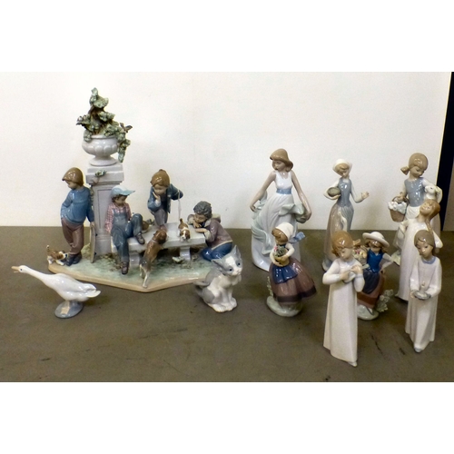 103 - Lladro china figures: to include a figure group, depicting children and puppies&nbsp; 15