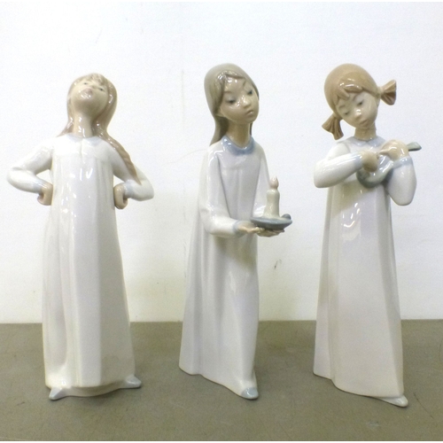 103 - Lladro china figures: to include a figure group, depicting children and puppies&nbsp; 15
