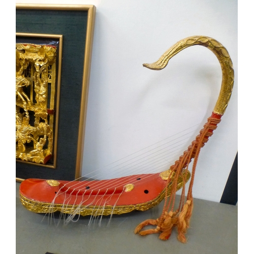 107 - A mixed lot: to include a Saung-Guak harp, decorated with gilding&nbsp; 13