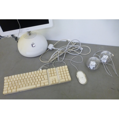 108 - A modern Apple IMac computer with a mouse, speakers and keyboard  20