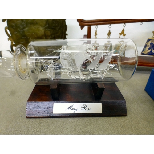 110 - A mixed lot: to include a graduated set of cloisonn&eacute; bells, in a hardwood frame&nbsp; 8