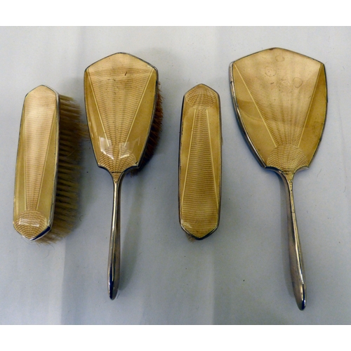 130 - Silver backed and enamelled dressing table accessories&nbsp; mixed marks&nbsp;