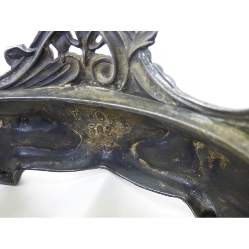 132 - An early 20thC Art Nouveau pewter dish stand, decorated with whiplash curves&nbsp; 12