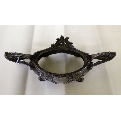 132 - An early 20thC Art Nouveau pewter dish stand, decorated with whiplash curves&nbsp; 12