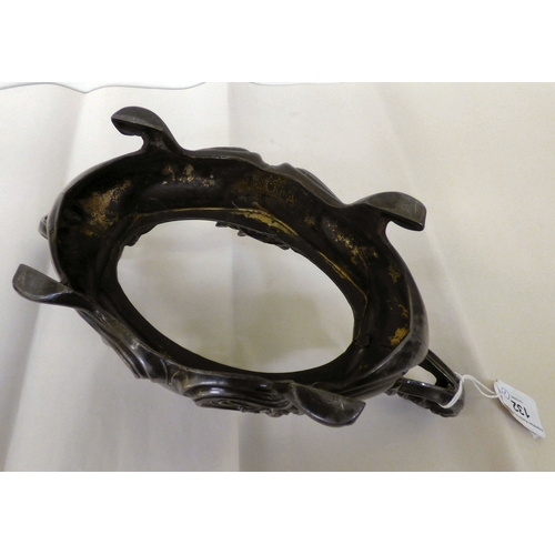 132 - An early 20thC Art Nouveau pewter dish stand, decorated with whiplash curves&nbsp; 12