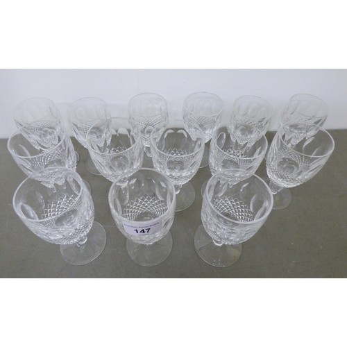 147 - Waterford lead crystal pedestal drinking glasses, a set of eight and a set of six&nbsp;