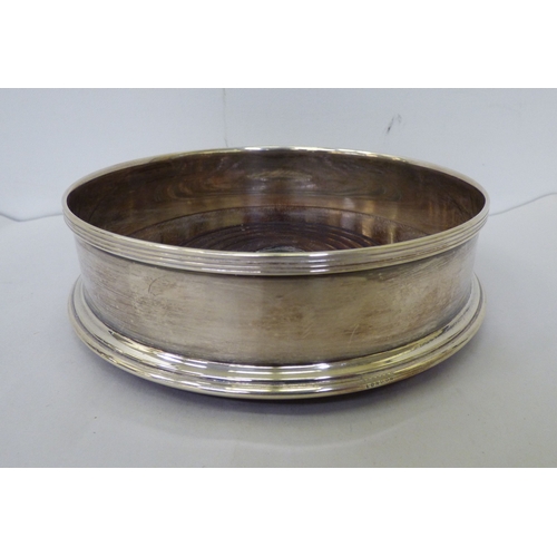 150 - Silver and loaded silver collectables: to include a wine bottle coaster&nbsp; indistinct London mark... 