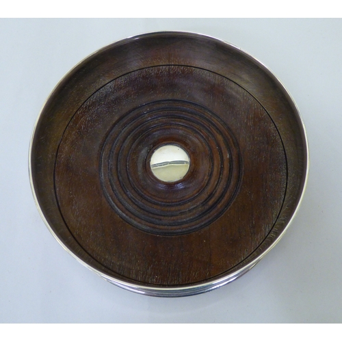 150 - Silver and loaded silver collectables: to include a wine bottle coaster&nbsp; indistinct London mark... 