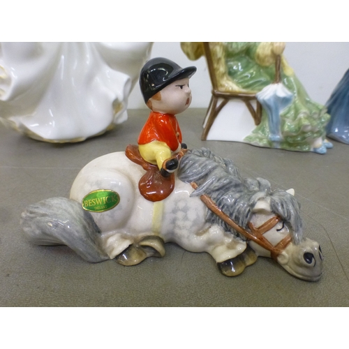 156 - Royal Doulton and Beswick china figures: to include 'Julia'&nbsp; HN2705&nbsp; 8