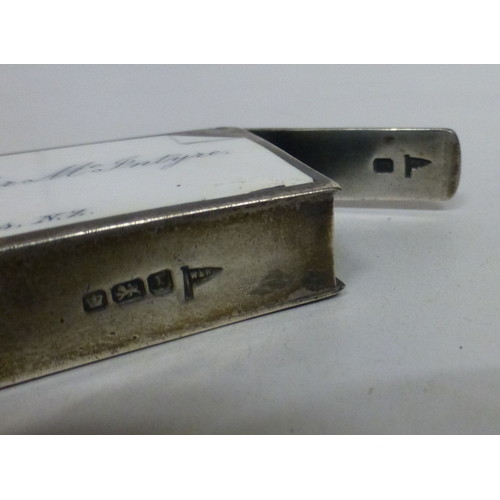 160 - A silver vesta  bears a named porcelain plaque for Alexander McIntyre and 'With Holzapjels Complimen... 