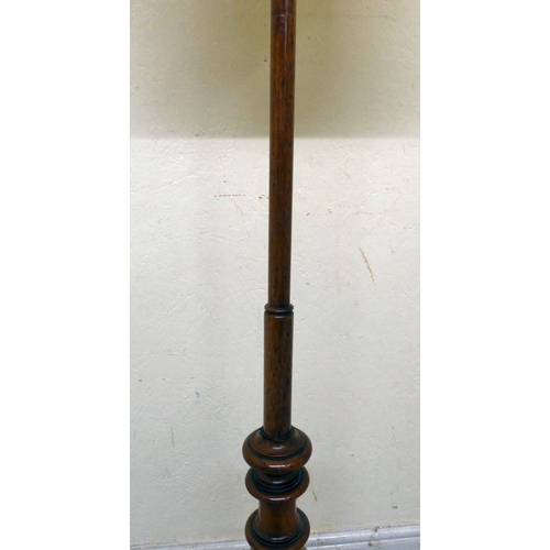 174 - A William IV mahogany polescreen with a height adjustable tapestry panel, raised on a tripod base  5... 