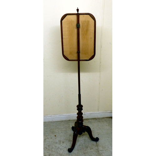 174 - A William IV mahogany polescreen with a height adjustable tapestry panel, raised on a tripod base  5... 