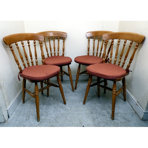 179 - A modern stained beech breakfast table, the top raised on a tripod base; and four matching chairs  3... 