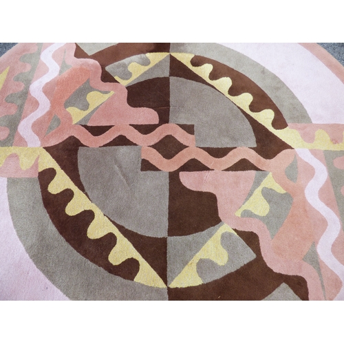 A Ron Nixon design rug, decorated with geometric shapes and patterns ...