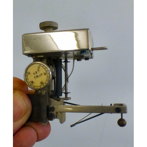 67 - A mixed lot: to include a mother-of-pearl inlaid, ebonised wooden box, decorated with figures amongs... 