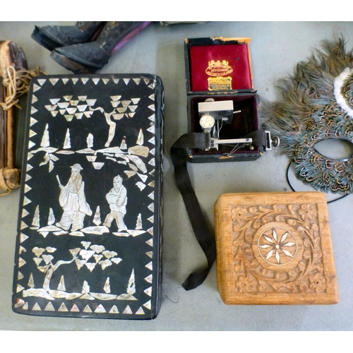 67 - A mixed lot: to include a mother-of-pearl inlaid, ebonised wooden box, decorated with figures amongs... 