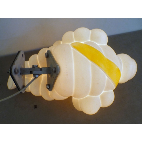 70 - A circa 1966 white plastic illuminating promotional model 'Michelin Man' on a wall bracket plinth  1... 