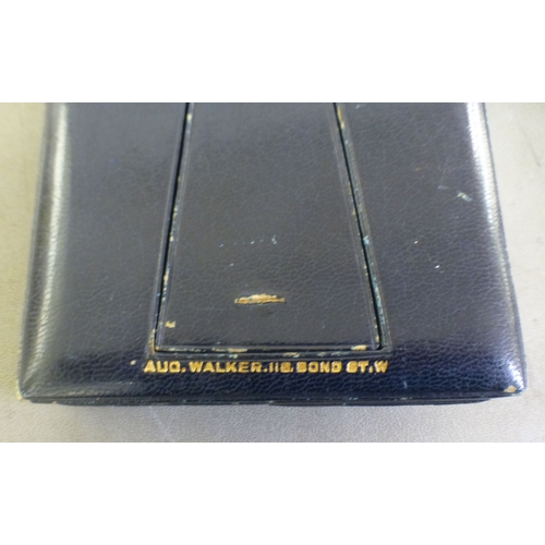 73 - S Sanony - an early 20thC portrait miniature, a formally dressed woman&nbsp; watercolour on porcelai... 