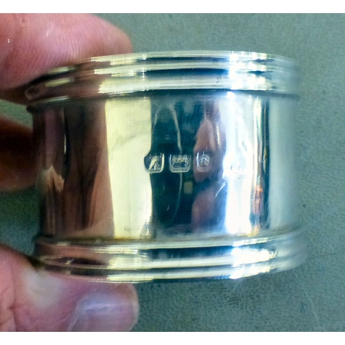 74 - A set of four silver napkin rings  Birmingham marks  cased  (approx. combined gross weight 148grms);... 