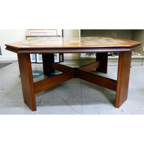 88 - A G-Plan teak framed coffee table with canted corners and tile top, raised on planked supports&nbsp;... 