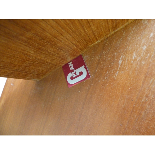 88 - A G-Plan teak framed coffee table with canted corners and tile top, raised on planked supports&nbsp;... 