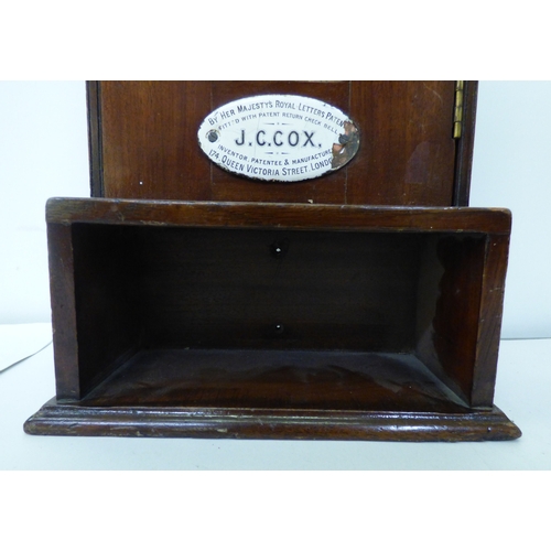 322 - A late Victorian JC Cox mahogany cased counter-top till  (probably incomplete, typically used in Pub... 