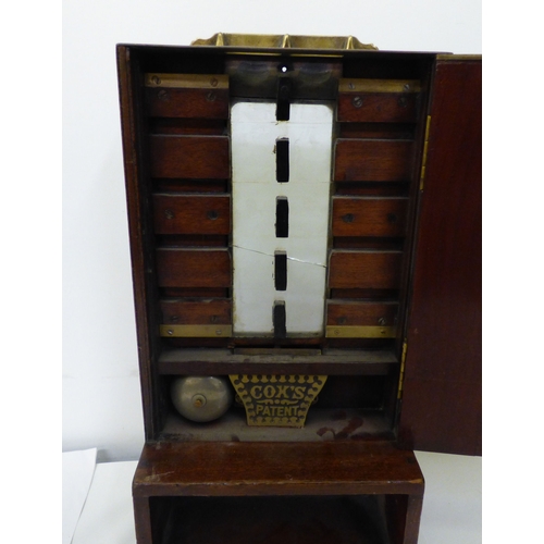 322 - A late Victorian JC Cox mahogany cased counter-top till  (probably incomplete, typically used in Pub... 