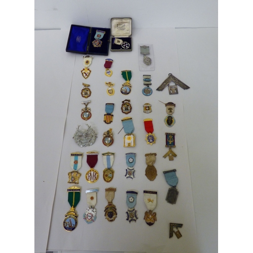 50 - Masonic medals and badges, some silver: to include 1950s and later examples