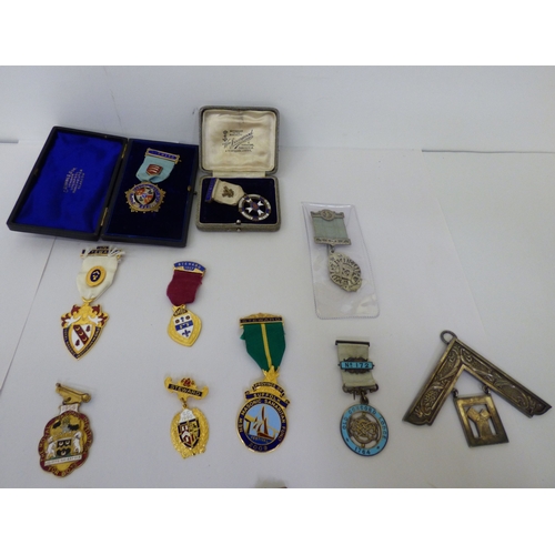 50 - Masonic medals and badges, some silver: to include 1950s and later examples