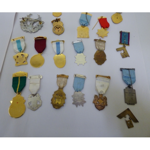 50 - Masonic medals and badges, some silver: to include 1950s and later examples