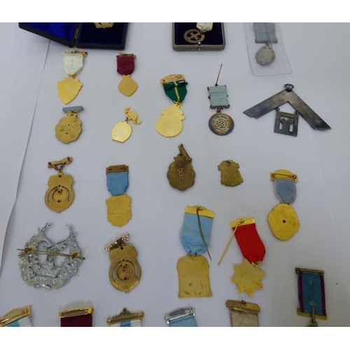 50 - Masonic medals and badges, some silver: to include 1950s and later examples