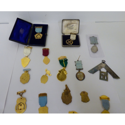 50 - Masonic medals and badges, some silver: to include 1950s and later examples