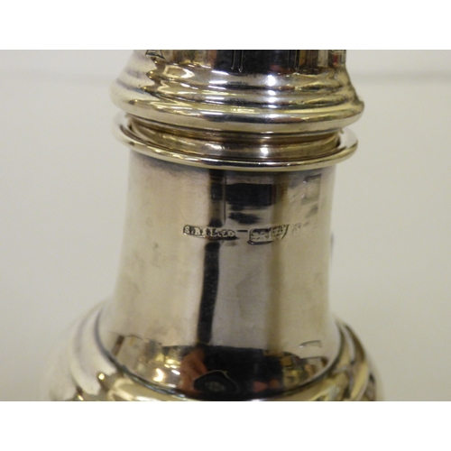 58 - A silver caster of pedestal form  Chester mark indistinct  (approx. 63.2grms)