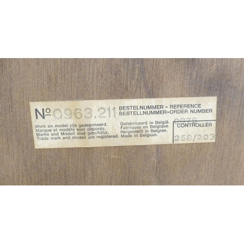 6 - A modern Continental inspired mirror, the shaped plate in a shell and C-scroll moulded gilt frame  3... 