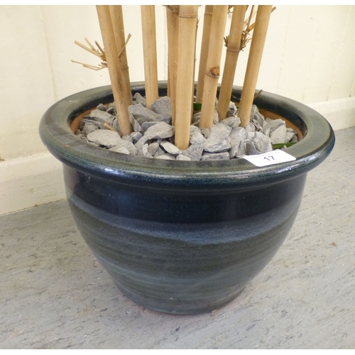 17 - A decorative artificial bamboo plant&nbsp; 66