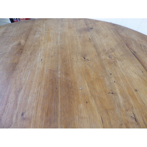 23 - A late 19th/early 20thC bleached mahogany centre table, the top raised on a grey painted pedestal an... 