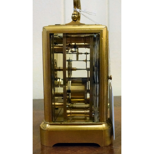 An Arnold of Paris lacquered brass carriage clock with bevelled glass ...