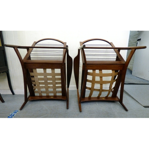 1 - A pair of IB Kofod-Larsen for G-Plan teak framed armchairs, the loose cushions upholstered in orange... 