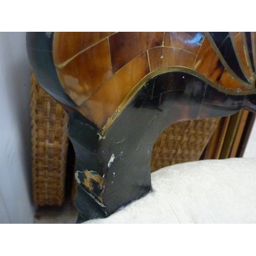 16 - A pair of modern brass inlaid, faux tortoiseshell veneered chairs, the backs of shell design, uphols... 