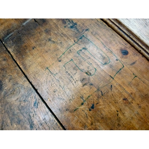 19 - A mid/late 19thC oak farmhouse style dropleaf table, raised on square, tapered legs, united by a cro... 