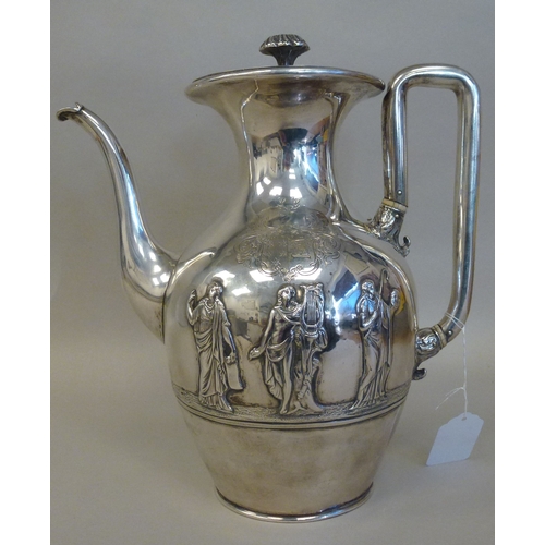 2 - An early Victorian silver hotwater jug, embossed in relief with five classical figures  London 1842 ... 
