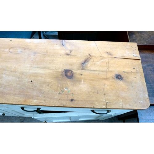 20 - A late 19thC and later cream painted wooden sideboard, the showwood pine surface over two drawers/tw... 