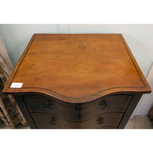 22 - An early 20thC string inlaid mahogany serpentine front chest of drawers, raised on tapered legs and ... 