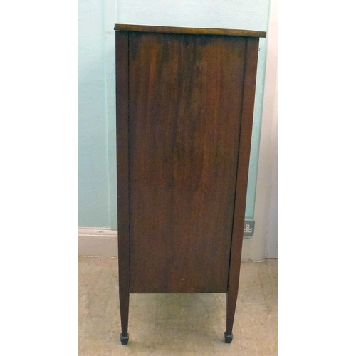 22 - An early 20thC string inlaid mahogany serpentine front chest of drawers, raised on tapered legs and ... 