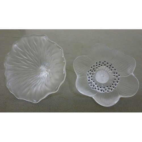 246 - Two Lalique frosted glass paperweights, fashioned as flowers  signed Lalique France  each 4