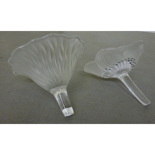 246 - Two Lalique frosted glass paperweights, fashioned as flowers  signed Lalique France  each 4